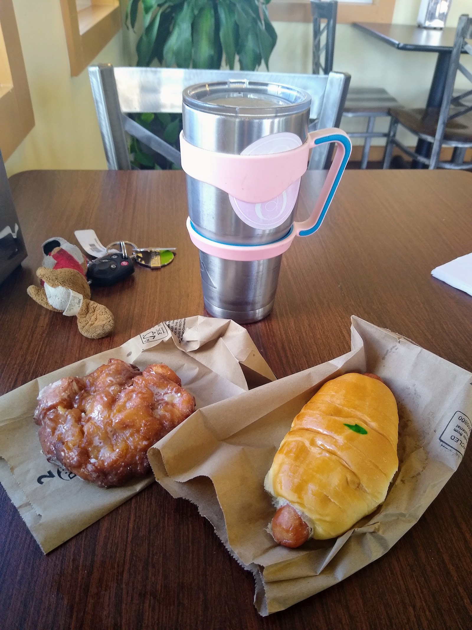 Apple fritter and kolache on the table, ready to eat