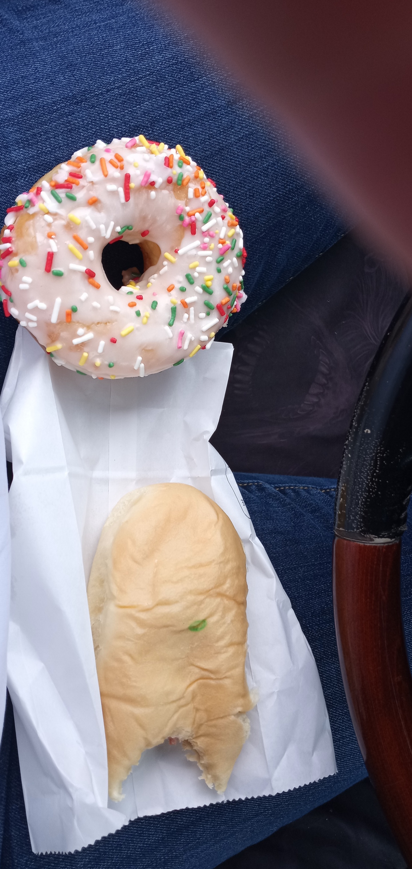 Close-up of a rainbow sprinkle donut